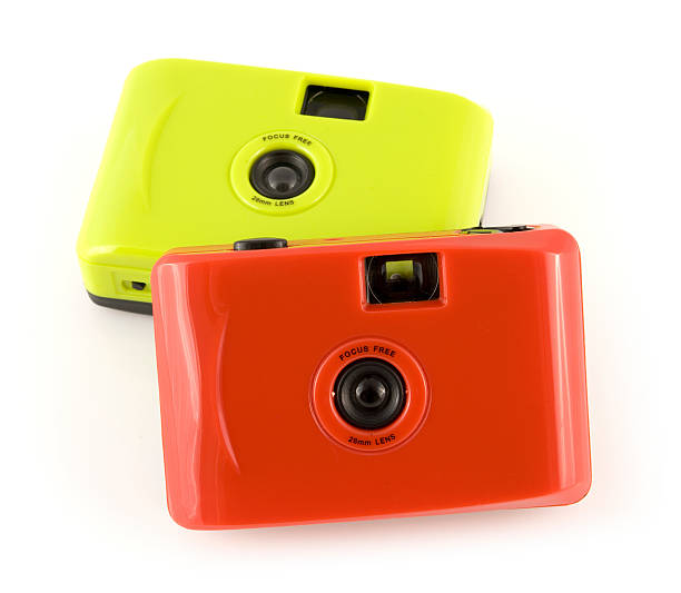 istock Two toy 35mm film cameras isolated on a white background 175175621