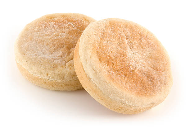 English muffins isolated on a white background English muffins on a white background. english muffin stock pictures, royalty-free photos & images