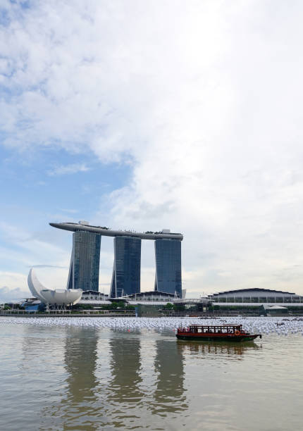 Singapore - Dec 14, 2015. A tourist boat on Marina Bay in Singapore. Singapore is third-largest foreign exchange market, third-largest financial centre.