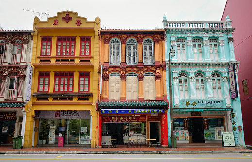 Singapore - Dec 15, 2015. Old buildings located on main street in Chinatown, Singapore. Chinatown is a bustling mix of old and new, filled with traditional shops and night markets.