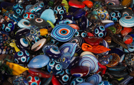 Multicolored painted ceramic oriental plates in the market at Medina. Marakesh. Morocco. Oriental interior design