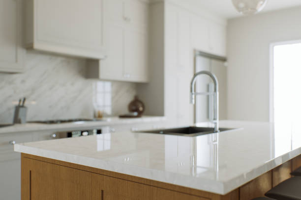 istock View of a kitchen island, white marble countertop with blurred white kitchen background for product presentation. Table with blurred kitchen background in bokeh. 3D rendering 1751770081
