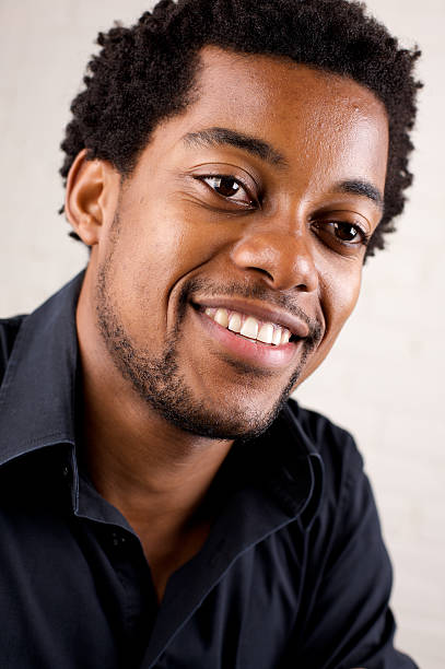istock Young attractive African American smiling male 175177536