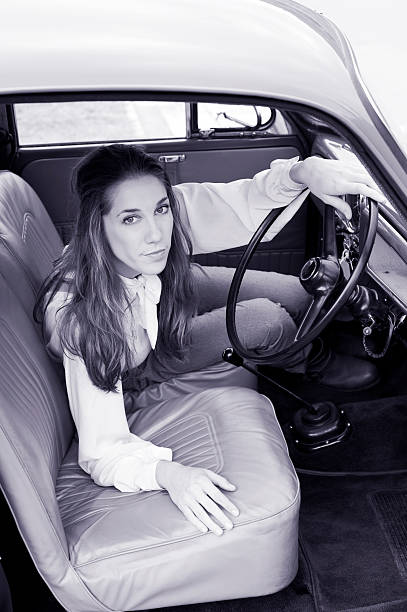 istock Woman in a Vintage Car 175177571