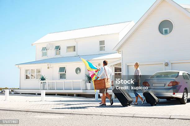 Arriving At Their Holiday Destination Stock Photo - Download Image Now - Vacation Rental, Family, Beach House