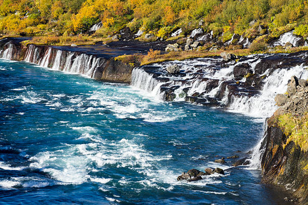 hraunfossar, iceland hraunfossar waterfall in western iceland hraunfossar stock pictures, royalty-free photos & images