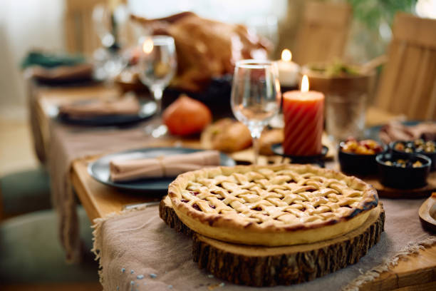 Traditional Thanksgiving sweet pie on dining table.
