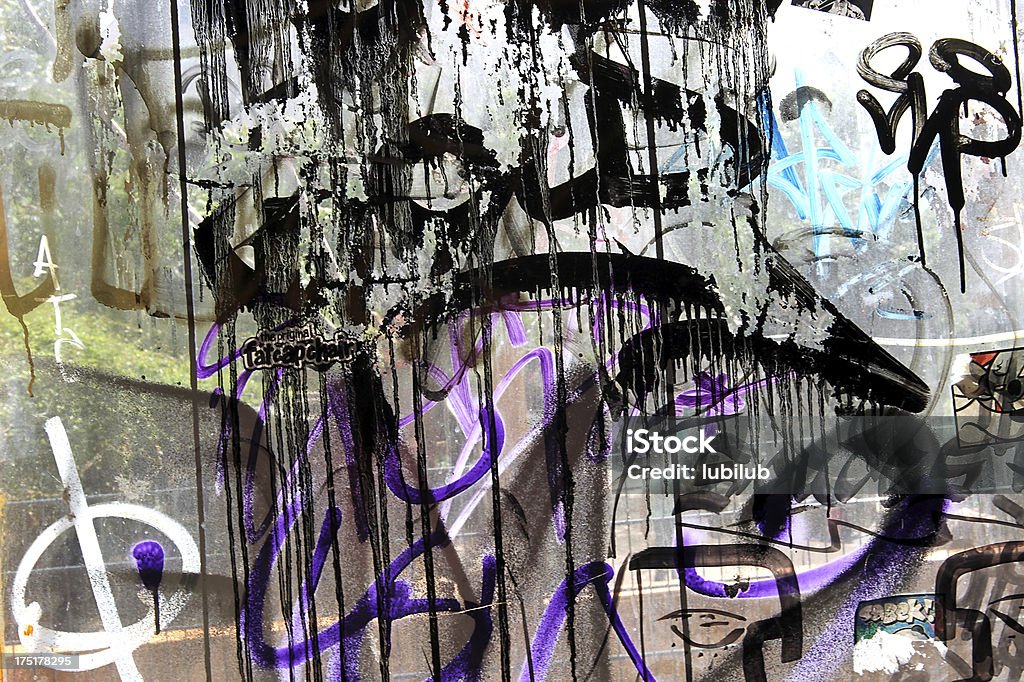 Graffiti on windows from Arthouse Tacheles in Berlin, Germany.  (Series) Graffiti on windows in old building in Berlin named Kunsthaus Tacheles. Tacheles was a large (9000 square meter) building on Oranienburger Strasse.  It's an art center and nightclub opened in spring 1990 in East Berlin after the Berlin Wall came down. Kunsthuas Tacheles was closed by the owner of the building on 4. of September  this year. Very sad story for many artist's and visitors. From same place:: Similar: Abandoned Stock Photo