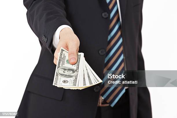 Businessman Giving Money Stock Photo - Download Image Now - Adult, Adults Only, American One Hundred Dollar Bill