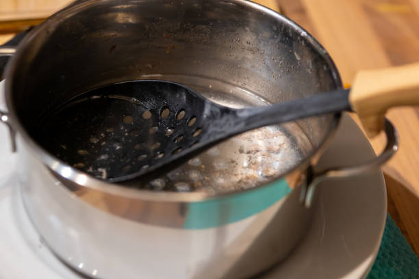 istock a straining spoon in the kitchen in a cooking pot 1751784226
