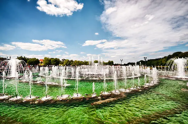 "Really fantastic and big fountain in in Tsaritsyno Park, Moscow, Russia. Beautiful and dramatic cloudscape over the green splashing water.See more images like this in:"