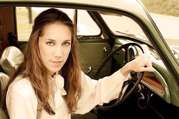 istock Woman in a Vintage Car 175179634