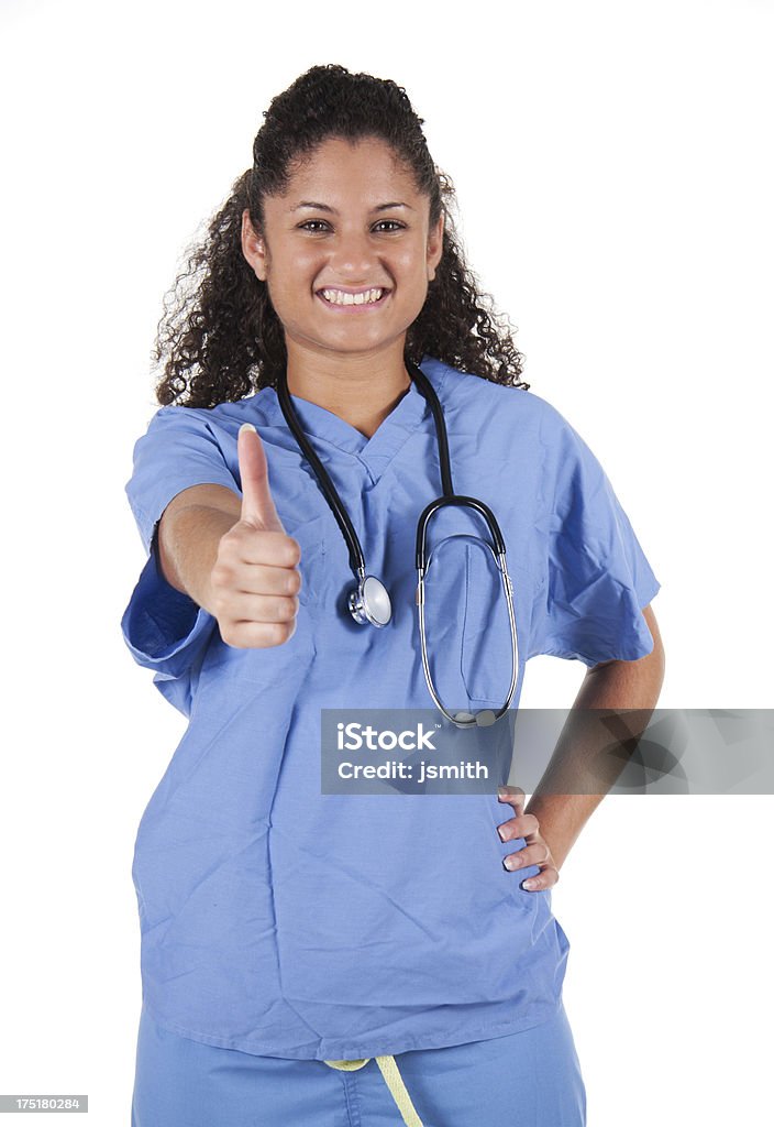Sorriso Latina infermiere con Stetoscopio pollice in alto - Foto stock royalty-free di Pollice in su