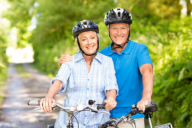 istock Senior Couple With Bicycles In Park 175180294