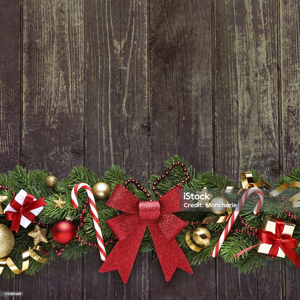 Christmas garland on rustic wood with copy space Christmas garland on rustic wood with copy space - XXXL Image Backgrounds Stock Photo
