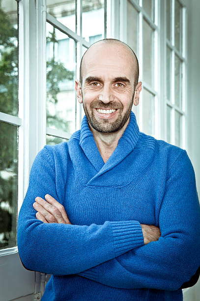 istock Mid adult man at home. 175180548