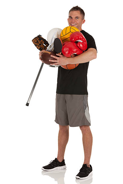 istock Sportsman holding assorted balls 175180631