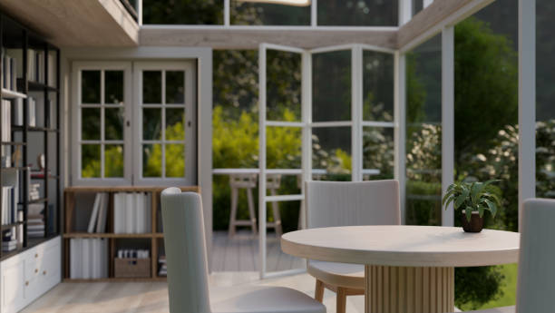 istock Copy space on a minimal dining table in a cosy room with a way through a beautiful garden on a deck. 1751808936