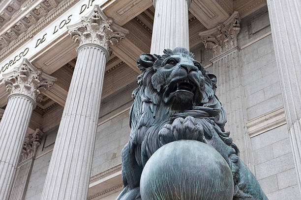 Spanish Congress facade. One of the lions at the entrance. The statue is from 1865.