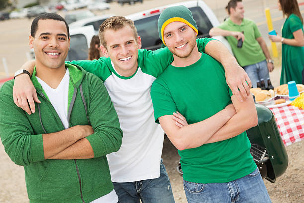 istock Sports fan buddies at a stadium tailgate party 175181784