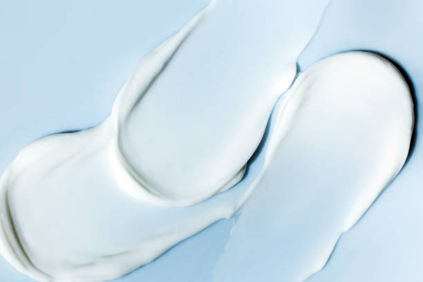 istock cosmetic smears cream texture on pastel blue background 1751820486