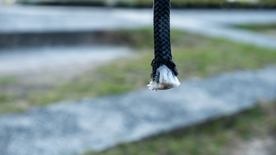 the hanging end of the rope
