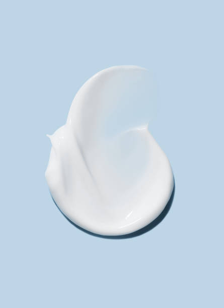 istock cosmetic smears cream texture on pastel blue background 1751821647