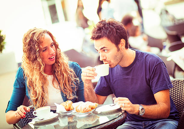 istock Young Couple Having a Traditional Italian Breakfast 175182533