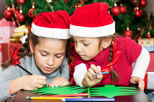 istock Two Beautiful Sisters making Christmas cards 175182737