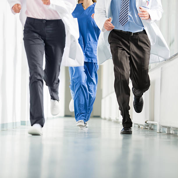 istock Group of Doctors Running in Corridor 175182878