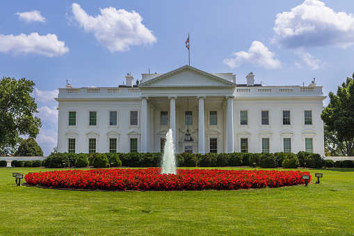 The USA White House during the 1950's. The White House is the official residence and workplace of the president of the United States. It is located at 1600 Pennsylvania Avenue NW in Washington, D.C., and has been the residence of every U.S. president since John Adams in 1800. Copyright has expired on this artwork. Digitally restored. Historic photos shows the U.S. White House in 1950 and its surrounding areas of Washington D.C.