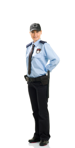 Woman security guard posing isolated on white background.