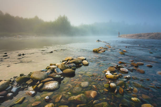 Alone on the foggy river ..