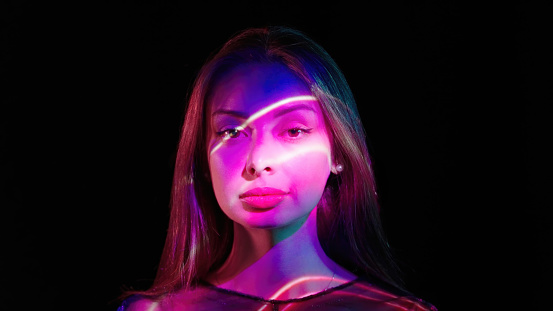 Abstract lights on a woman's face.