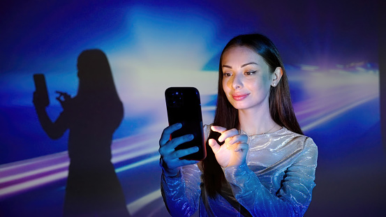 Young woman using a smart phone.