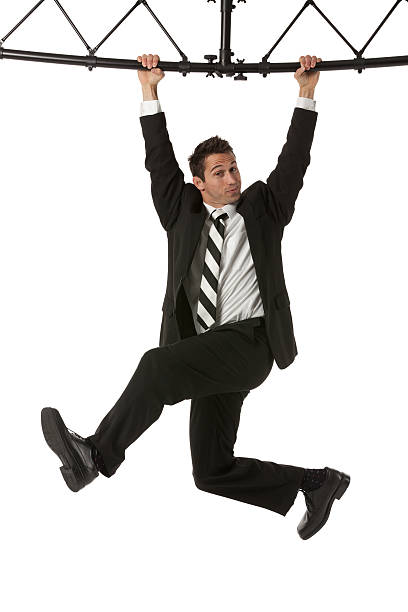 istock Businessman hanging with a metal structure 175184007