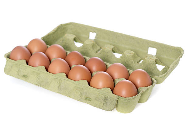 istock Brown eggs in a carton on white background 175184284