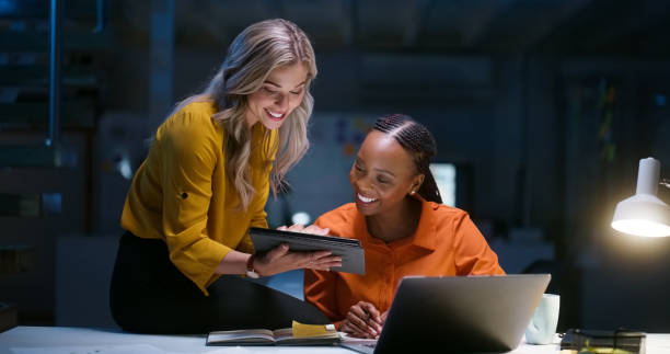 istock Business people, teamwork and tablet for night research, data analytics results, multimedia comparison and planning. Professional women or manager with digital technology, happy report and proposal 1751843413