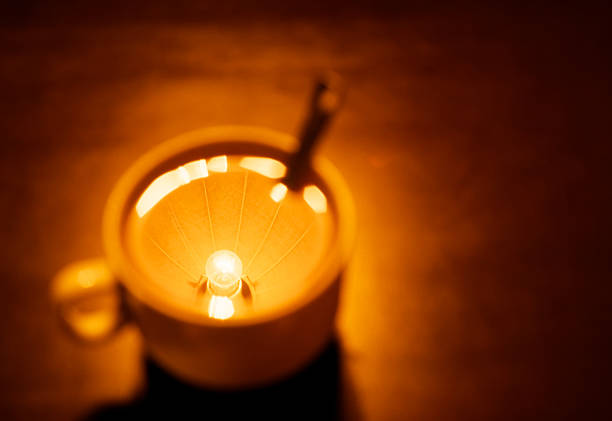 istock Lamp reflected in a cup of tea 175184492