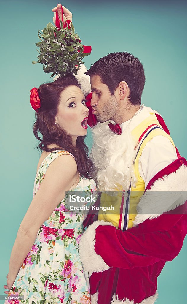 Santa und Mrs. Claus - Lizenzfrei Küssen Stock-Foto