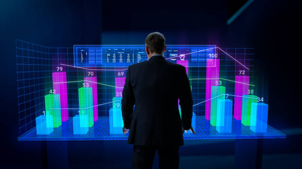 istock Business Metaverse and Virtual Space Concept: Businessman Operating an Augmented Reality Dashboard in Cyberspace. Specialist Touching the Hologram to Show Interactive Charts and Graphs with Statistics 1751850154