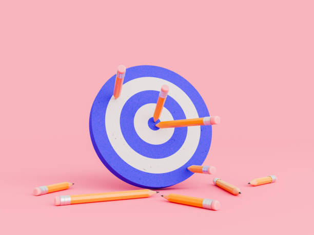 istock pencils stuck in a target and several on the ground 1751851319