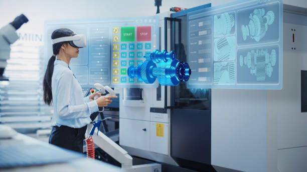 istock Professional Research and Development Specialist Wearing Virtual Reality Headset, Managing Settings on an Industrial Machine at a Factory Facility. Digital Hologram Showing Mechanism in Action 1751853606