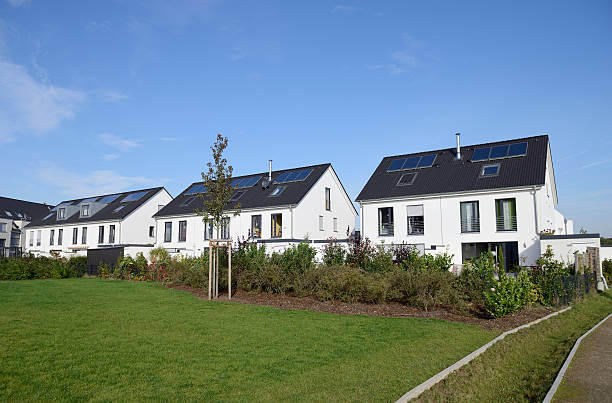 istock Row of modern  white detached houses 175185567