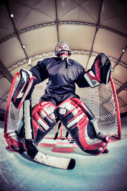 istock Little league roller hockey goalkeeper in training 175185570