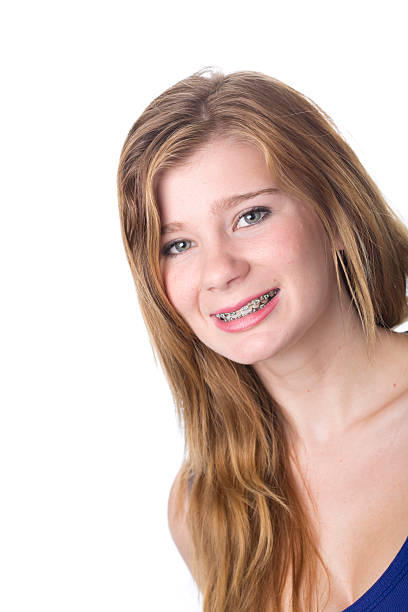 istock Smiling Young Woman With Braces 175185594