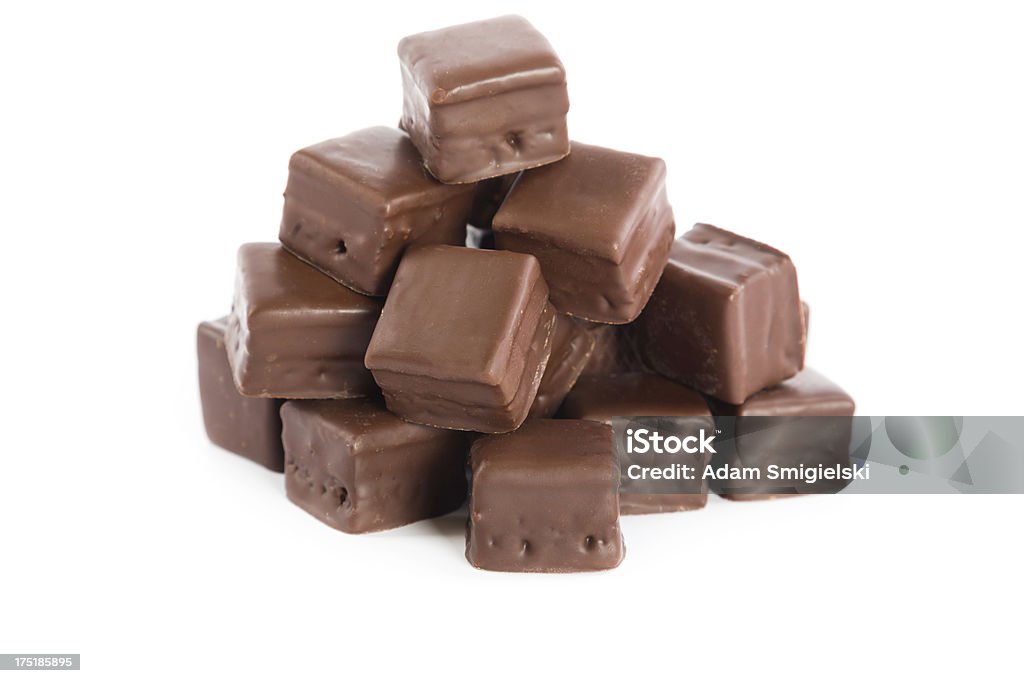 chocolate cubes chocolate cubes on white backgroundsee my Block Shape Stock Photo