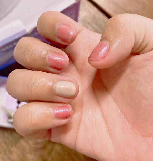 istock a manicure with pink manicure. 1751859121