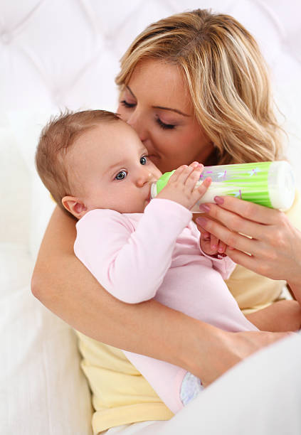 istock Mother feeding her baby 175186022