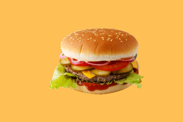 istock hamburger like in McDonald's with a beef cutlet on a yellow background, studio shooting 2 1751863367